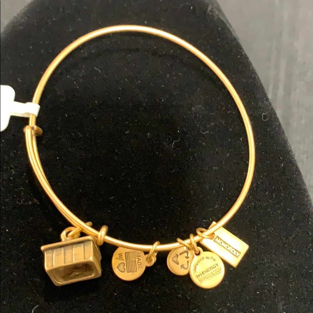 NWT Alex and Ani gold toned Monopoly bracelet